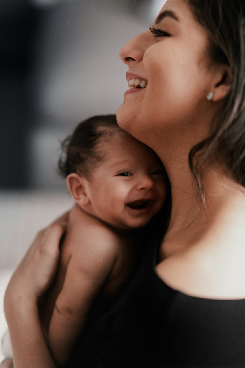 Happy mother and baby after a good night's sleep