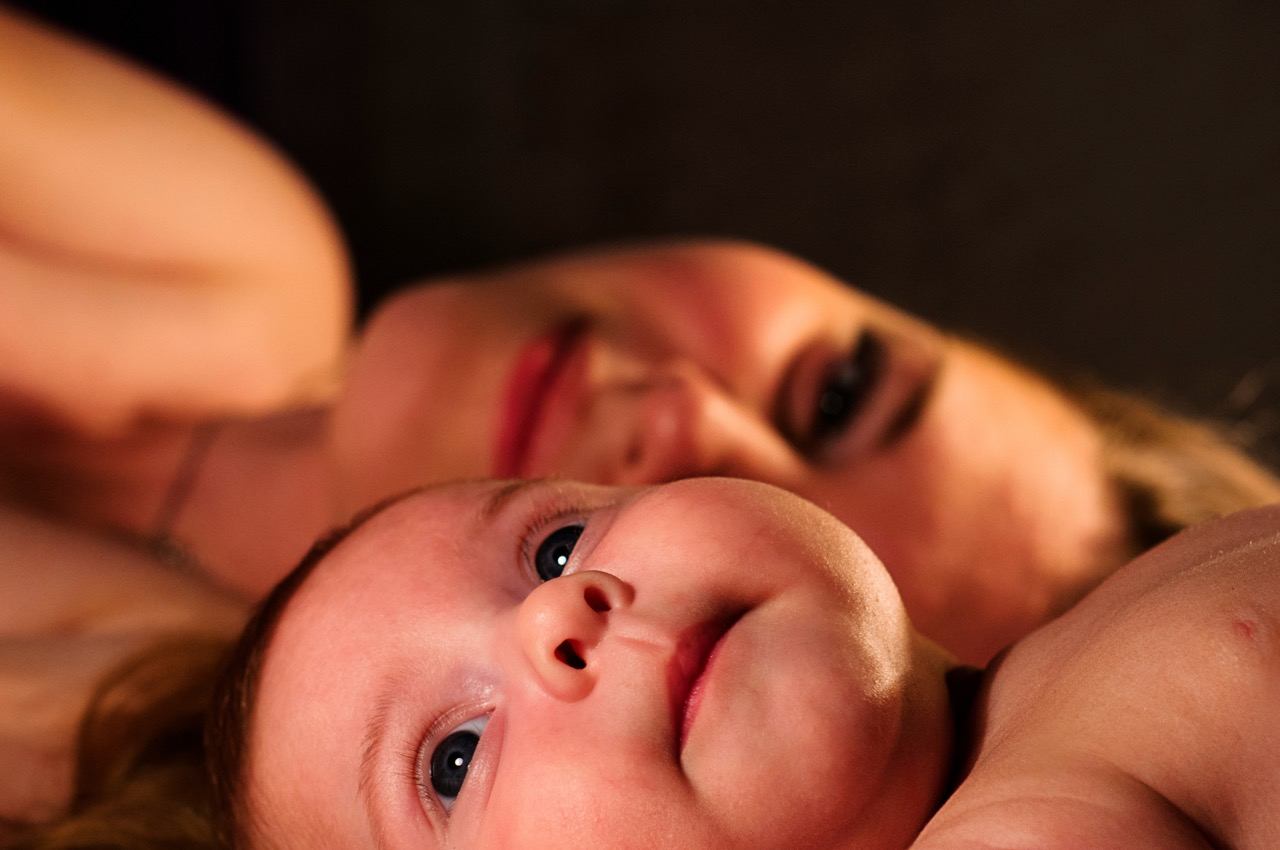 Mum and Baby Laying Together